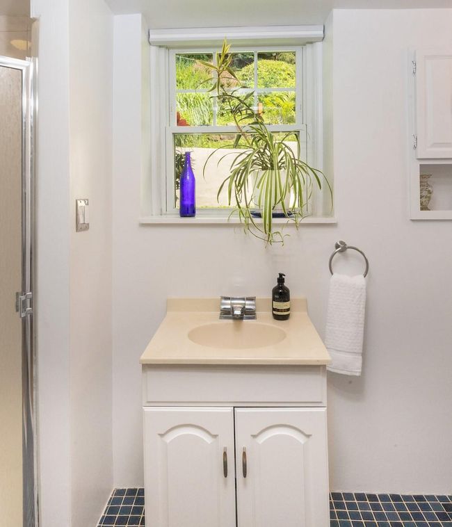Full bath featuring vanity and a shower stall | Image 20