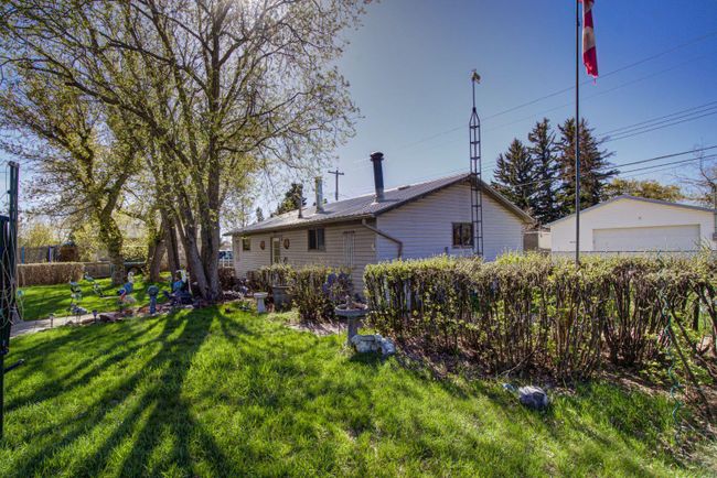 413 50 Avenue, Home with 4 bedrooms, 1 bathrooms and 6 parking in Claresholm AB | Image 47