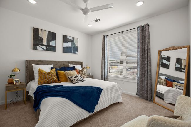 Spacious and bright bedroom is complete with ceiling fan *Photos are of similar unit* | Image 14