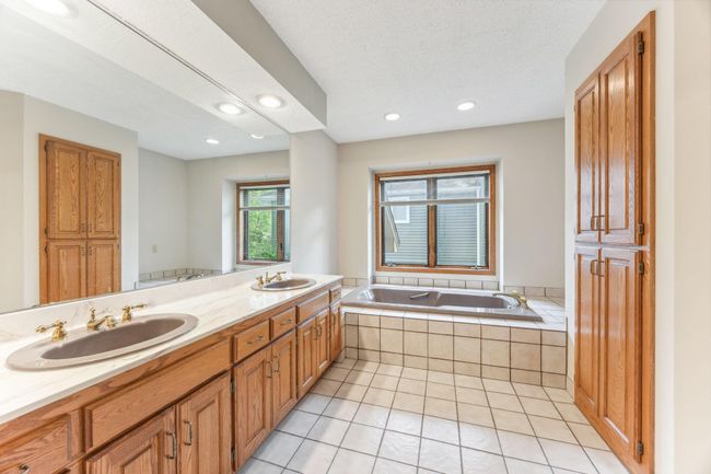 Primary ensuite. Shower, bath and dual sinks. | Image 10