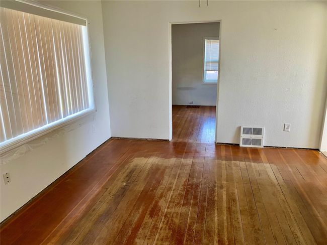 Living Room looking into primary bedroom | Image 7