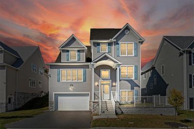 View of front of home with a garage | Image 2