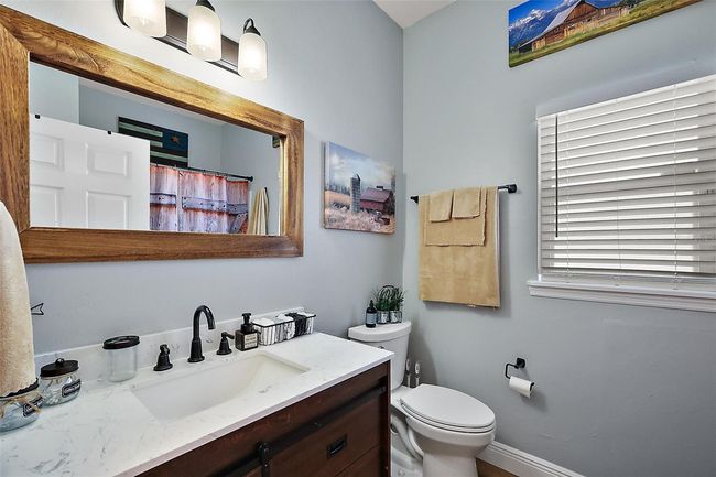 Guest bathroom features new vanity | Image 19