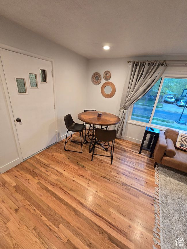 Dining area with baseboards, recessed lighting, and light wood-style flooring | Image 14