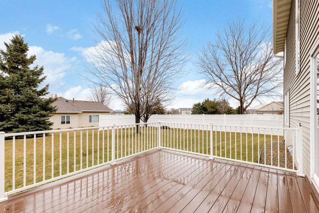 A maintenance-free deck built in 2019 . A partial privacy fence and a large backyard. | Image 26