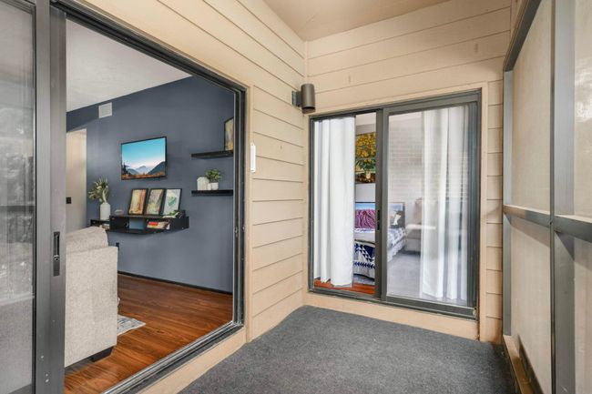 Direct porch access from main living area and primary bedroom | Image 27