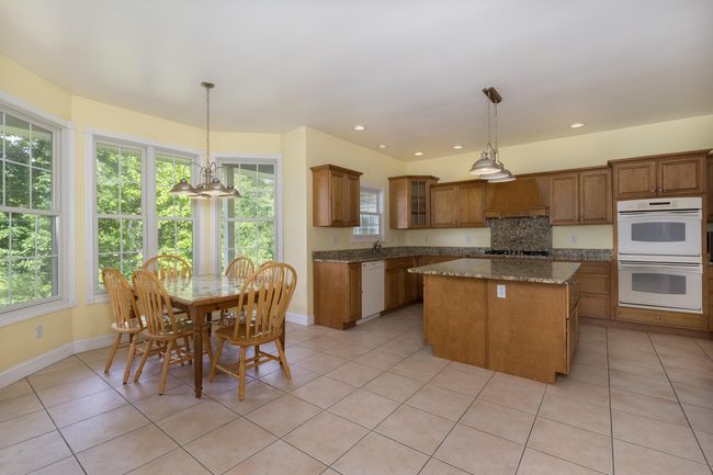 BIG, Spacious Kitchen with Sunny Breakfast Nook overlooking treed backyard. | Image 14