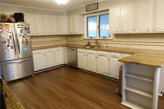 Fully equipped kitchen with abundant countertop space and cabinetry | Image 5