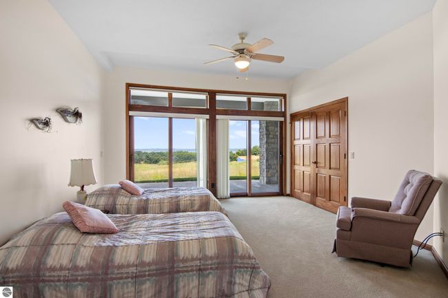 4173 Dornoch Ct, House other with 6 bedrooms, 4 bathrooms and null parking in Williamsburg MI | Image 32