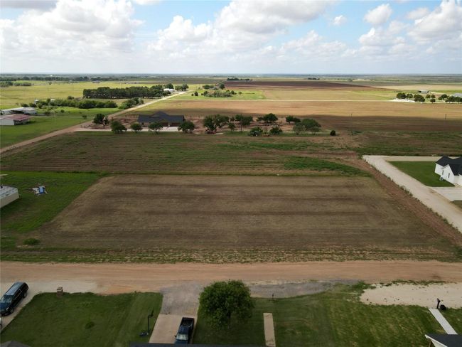 View of rural area featuring large plots for crops | Image 6