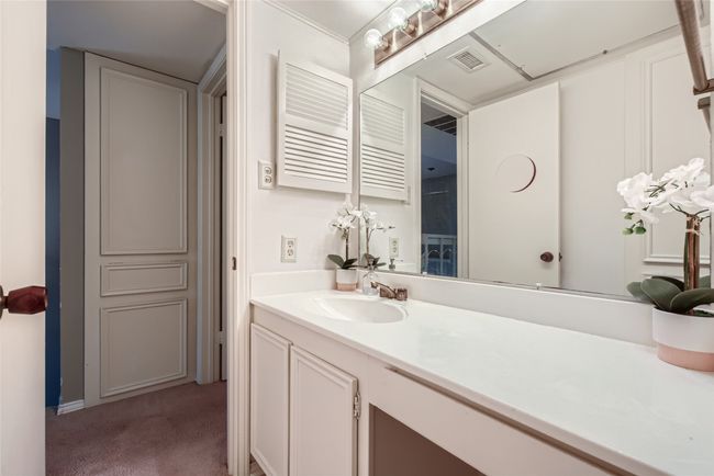 Bathroom featuring vanity | Image 21