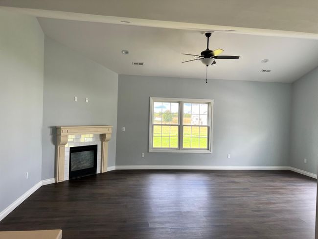 Living area with gas log fireplace | Image 8