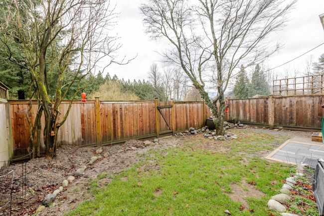 Fenced backyard featuring a gate | Image 33