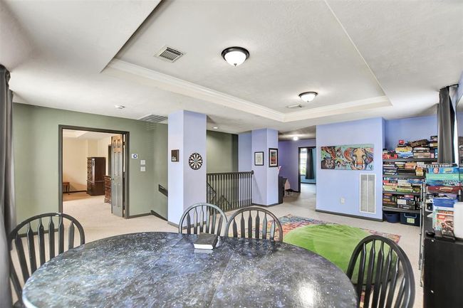 Split floor plan with view to the Primary Bedroom and secondary rooms | Image 29