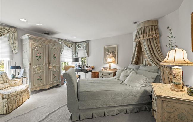 Bedroom featuring multiple windows, light carpet, and recessed lighting | Image 31