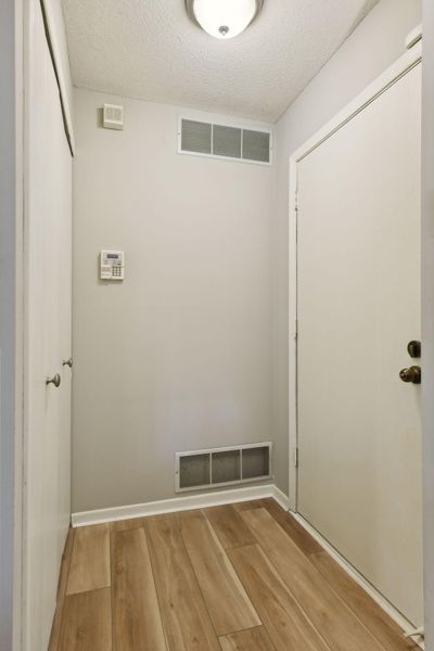 Coat closet inside the front door. | Image 2