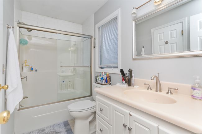 The first floor full bathroom - accessible via the kitchen or the bedroom. | Image 14