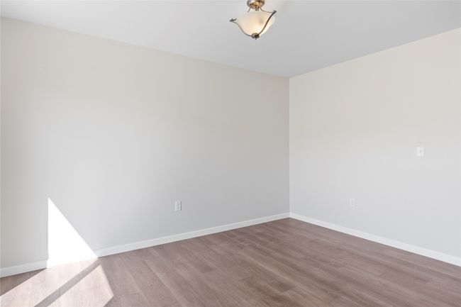 Unfurnished room with baseboards and wood finished floors | Image 40