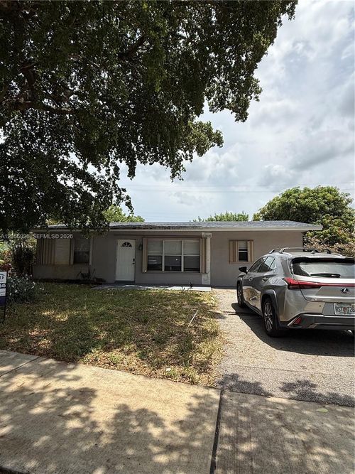 1640 Ne 33rd St, Pompano Beach, FL, 33064-6734 | Card Image