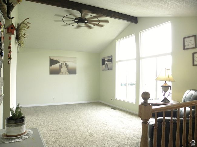 Good sized Living Room with Vaulted Ceiling, Ceiling Fan and Natural Light! | Image 7