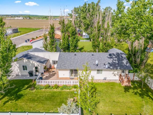 Side of home and yard from overhead | Image 5