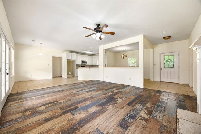 This view is the living and dining areas prior to staging. | Image 11