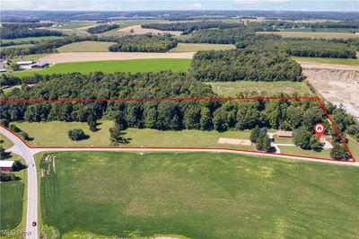 Home, animal barn, loafing shed, pasture, and woods are all part of this amazing property! | Image 2