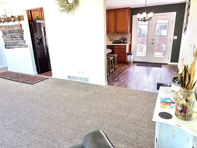Living Room Flows into the Dining area. | Image 8