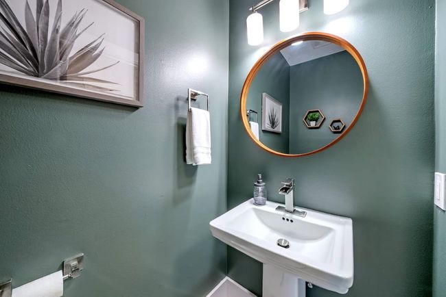 Bathroom featuring a sink | Image 8