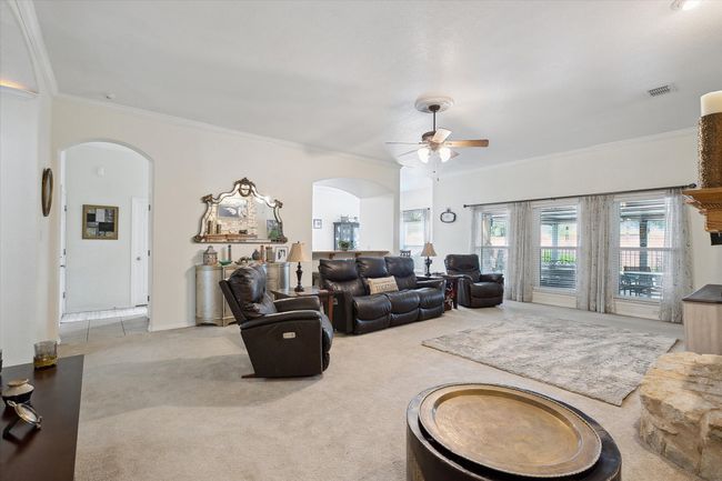 Spacious living room with lots of natural light. | Image 7