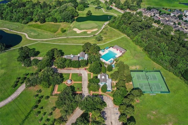 Residents enjoy access to a sparkling pool, inviting clubhouse, scenic walking trails, and a spacious 22-acre central park perfect for outdoor activities and gatherings. | Image 41