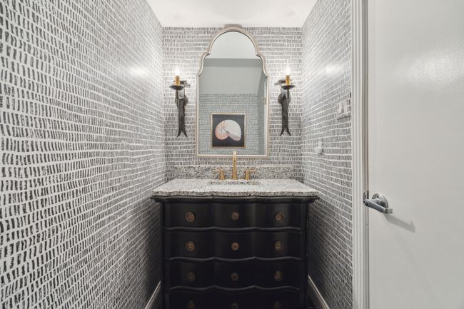 Half bath on first floor past under stair storage, pantry and then half bath. | Image 9