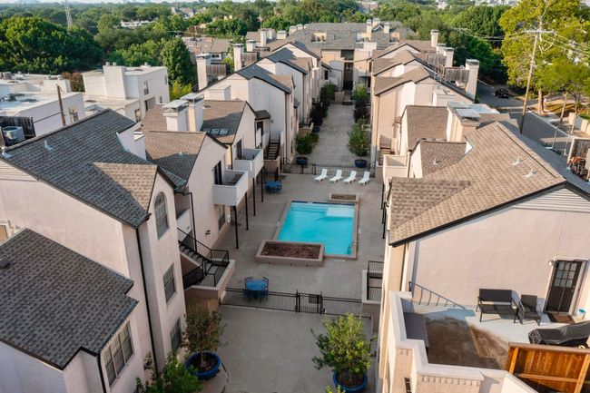 Aerial perspective of suburban area featuring a pool | Image 13