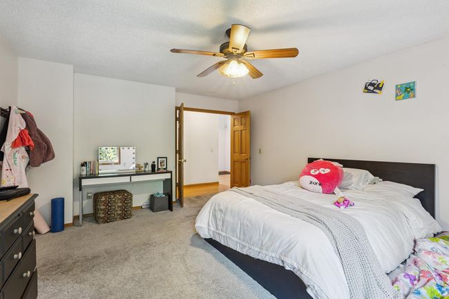 Vaulted Primary Bedroom with oversized walk in closet | Image 13