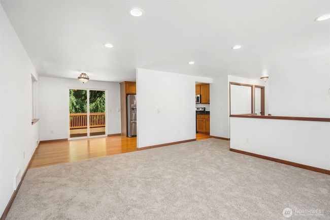 Living Room looking towards Kitchen/Dining/Deck access | Image 13