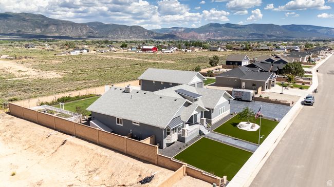 Aerial view of property and surrounding area with a mountain backdrop | Image 120