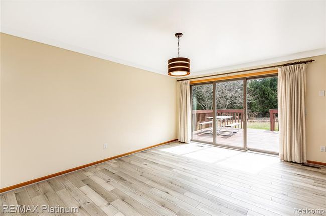 Open area for eating with a great view of the wooded backyard! | Image 20