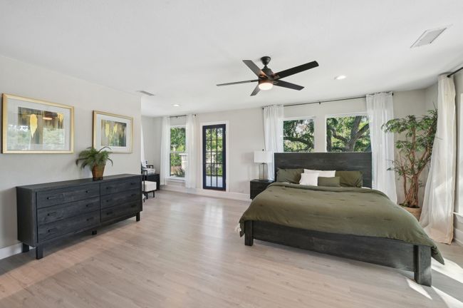 Bedroom with light wood-type flooring, baseboards, recessed lighting, and ceiling fan | Image 18