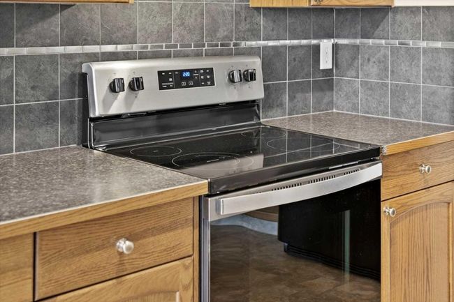 156 Rockyspring Grove Nw, Townhouse with 3 bedrooms, 3 bathrooms and 2 parking in Calgary AB | Image 5