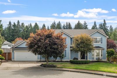 The covered porch welcomes you to this fabulous home. | Image 2