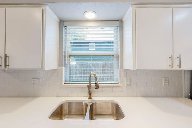 Kitchen sink overlooking side yard | Image 18
