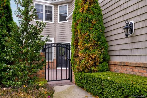 702 Equestrian Way, Westbury, NY, 11590-6679 | Card Image