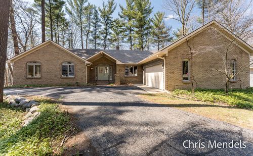 3140 Riverwoods Dr Ne, Rockford, MI, 49341-9264 | Card Image