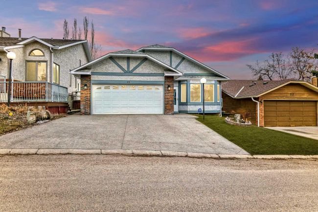 23 Sanderling Rise Nw, Home with 4 bedrooms, 3 bathrooms and 5 parking in Calgary AB | Image 1