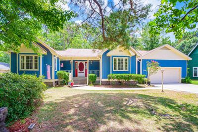 Single story home with a front lawn | Image 1