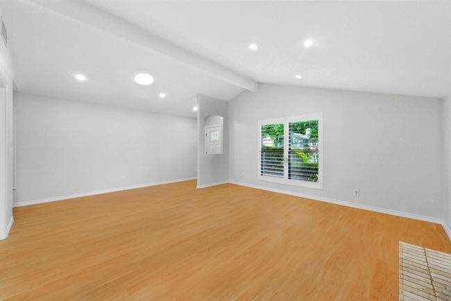 Living room with view to entry | Image 6