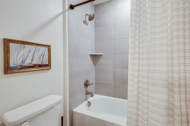 Separate shower area in Jack and Jill bathroom. | Image 32