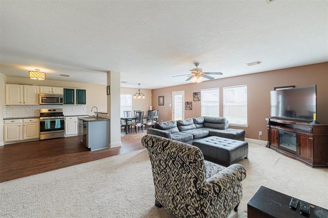 Another view showing the open family and kitchen areas. | Image 13