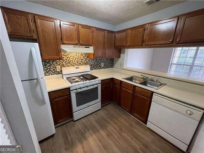 609 Windchase Ln, Condo with 2 bedrooms, 2 bathrooms and 1 parking in Stone Mountain GA | Image 4