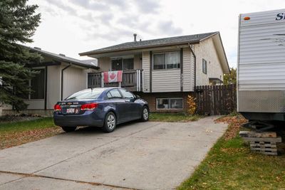 2220 23 Ave N, Home with 4 bedrooms, 2 bathrooms and 2 parking in Lethbridge AB | Image 1